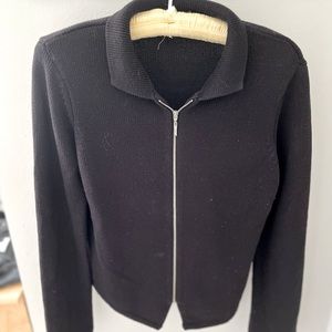 Black zip-up sweater by Daisy Fuentes